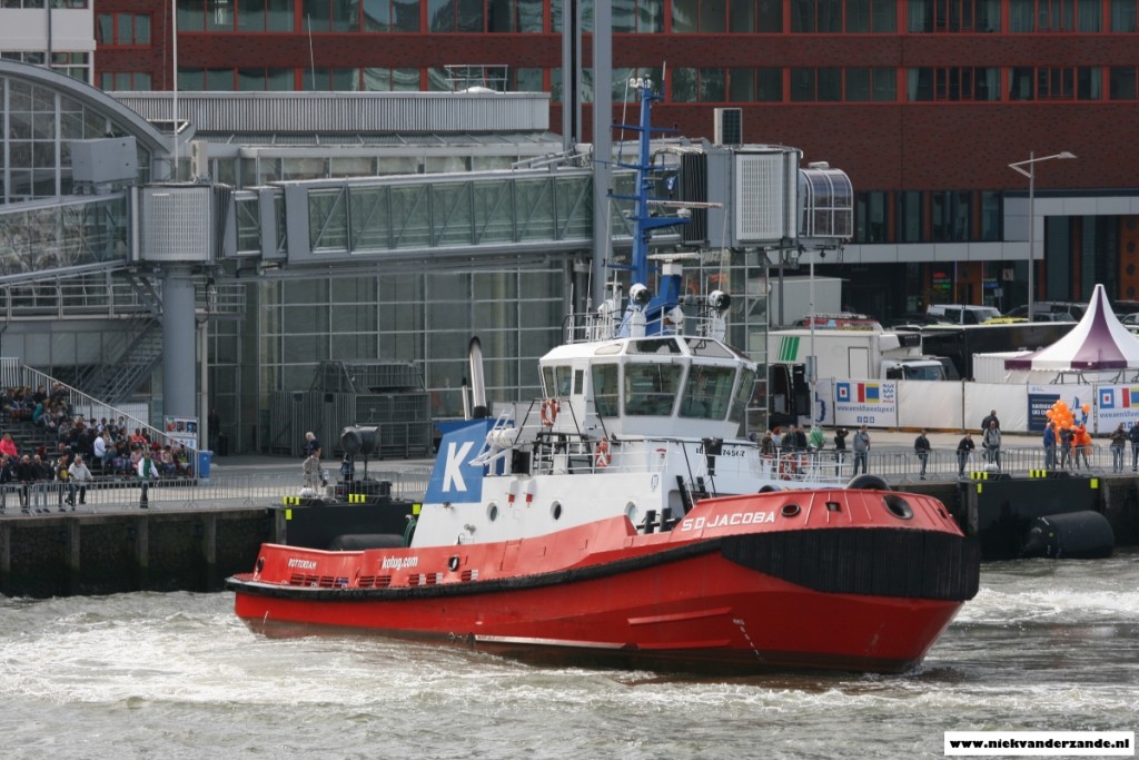 A tug shows its power and tight turning radius