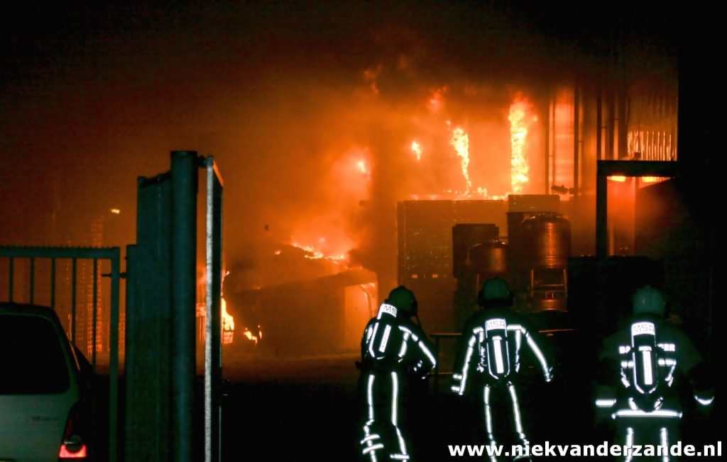 Firemen in action at a large fire in Hengelo